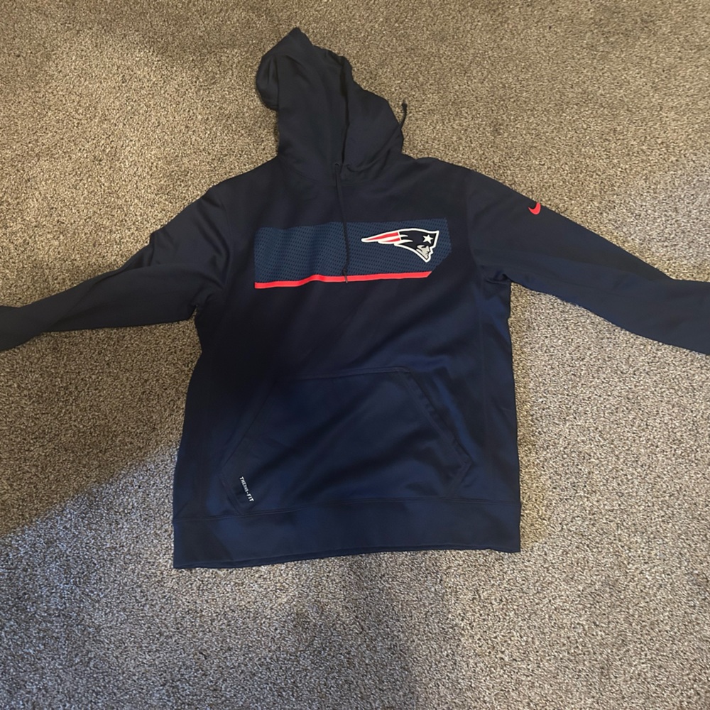 New England Patriots authentic Nike hoodie, size medium. Slightly used.
